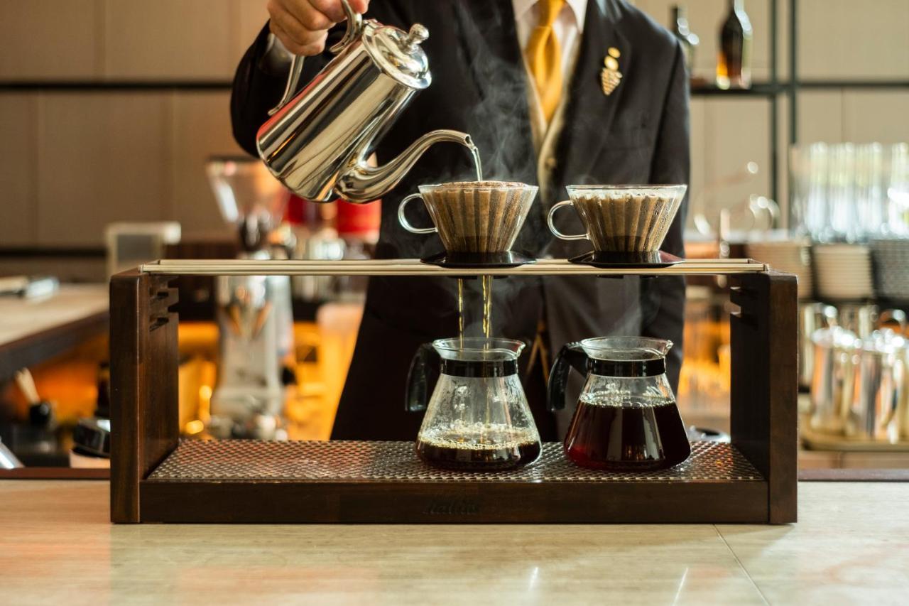 Hotel Okura Fukuoka Fukuoka  Bagian luar foto A coffee being brewed with the V60 method